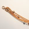 Armband Rotgold/Weißgold aus 5 Ankerkettchen