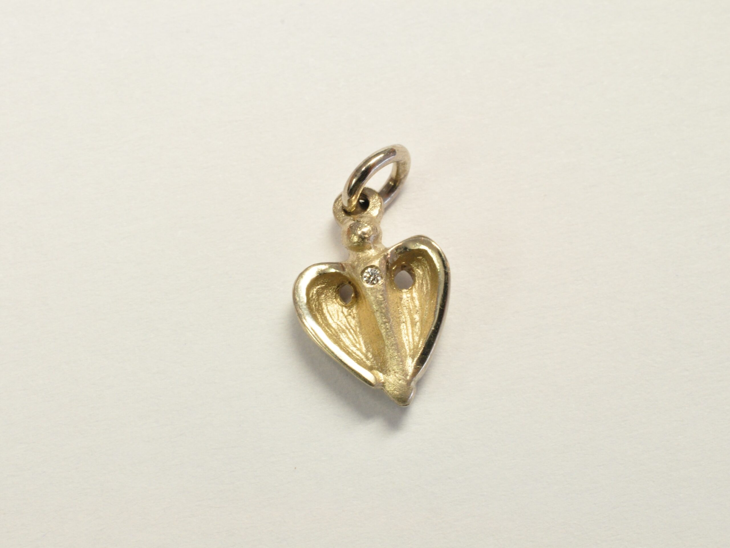 Unser kleinster Schutzengel Anhänger aus 585 Weißgold mit Diamant
