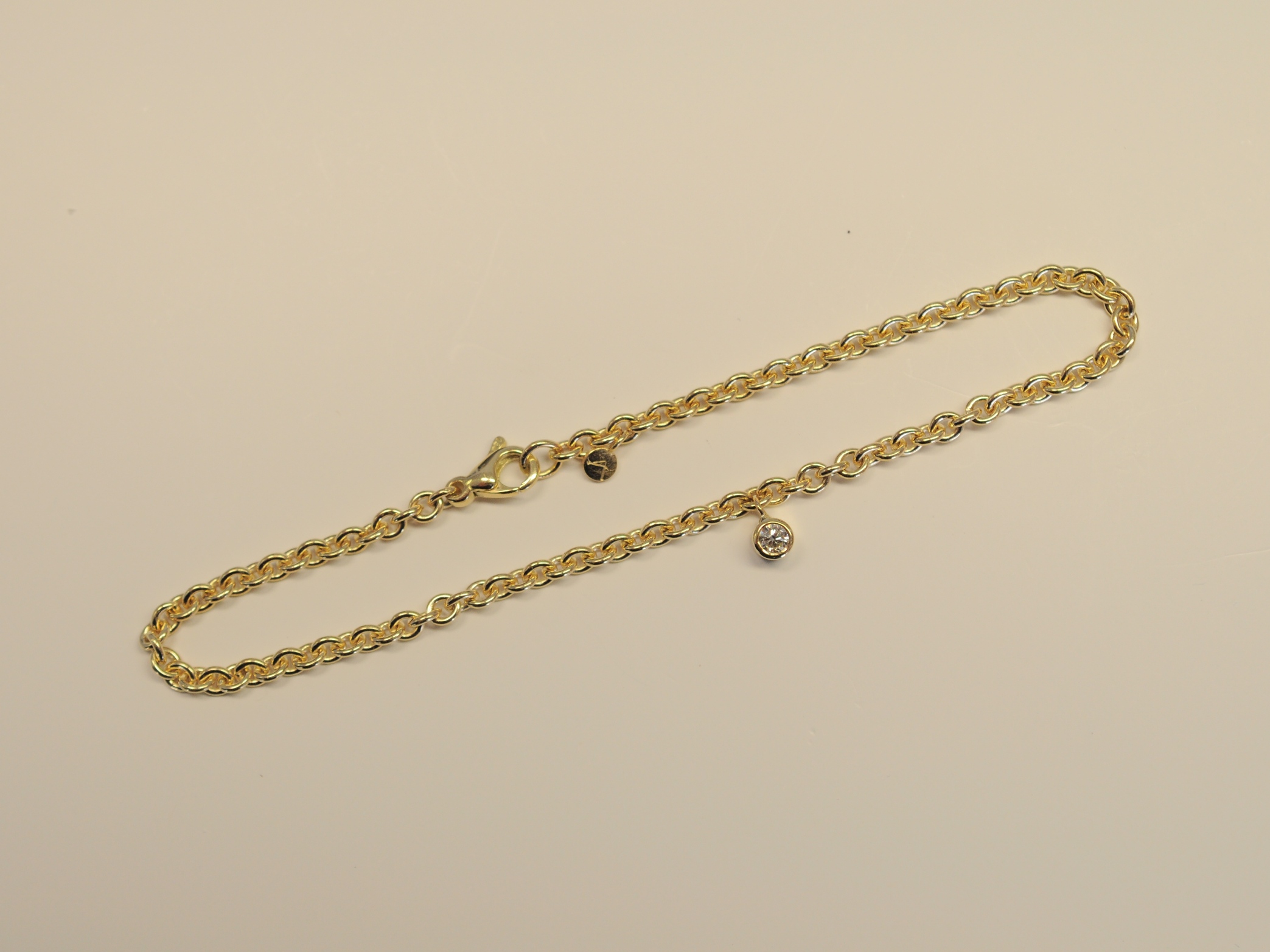 Armband Ankerkette aus 750 Gelbgold mit Diamant in Zargenfassung